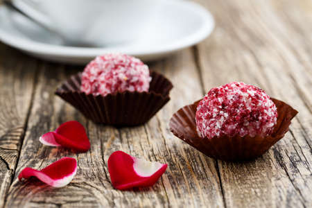 Vegetarian truffle candies on wodden table for celebration.