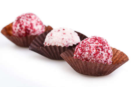 Vegetarian truffle candies isolated on white background.