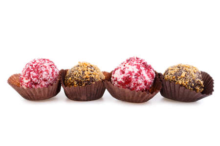 Vegetarian truffle candies isolated on white background.