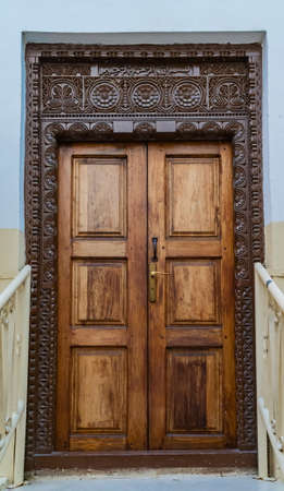 Antique Indian style Wooden Door in Stone Town, Zanzibar, Tanzania.の写真素材