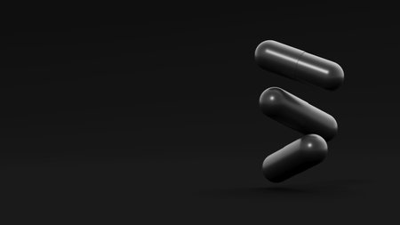 Three black capsules, pills float on black background. Medicinal treatment, tablet, cure concept. Place for text. 3d render illustrationの写真素材