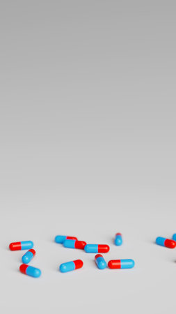 Blue and red pills on white background with shallow DOF. Drugs, pills, tablets, medicine concept. 3d render illustration.の写真素材