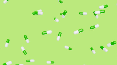 Green white capsules fall against green backdrop. Drugs, pills, tablets, medicine concept. 3d render illustration.の写真素材
