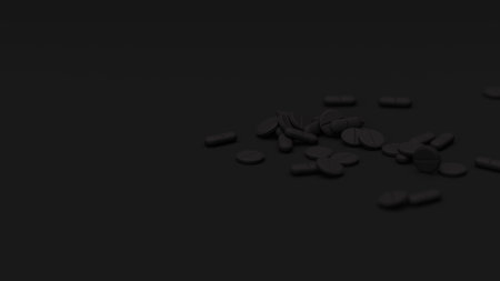 Black tablets on black background with shallow DOF. Drugs, pills, tablets, medicine concept. 3d render illustrationの写真素材