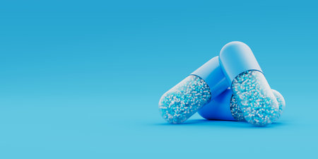 Three blue transparent capsules, pills with blue granules inside lay on blue background. Medicinal treatment, tablet, cure concept. Place for text. 3d render illustrationの写真素材