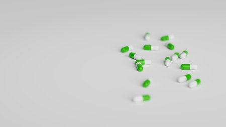 Green and white pills on white background with shallow DOF. Drugs, pills, tablets, medicine concept. 3d render illustrationの写真素材