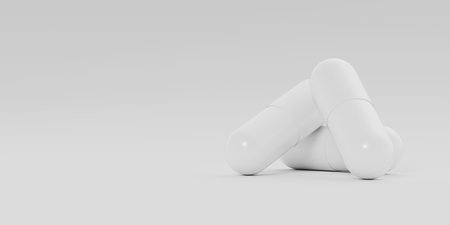 Three white capsules, pills lay on white background. Medicinal treatment, tablet, cure concept. Place for text. 3d render illustrationの写真素材