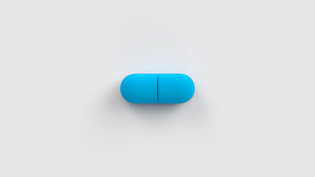 Blue single pill isolated on a white background. Tablet, pill capsule top view, flat lay. 3d render...