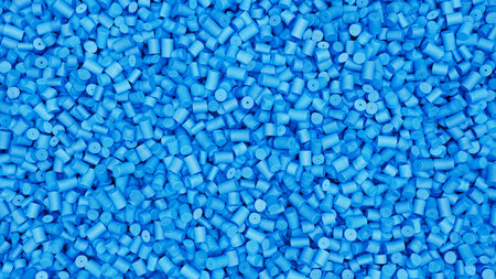 Closeup top view of blue plastic polypropylene granules, masterbatch polymer grain. HDPE or PVC...
