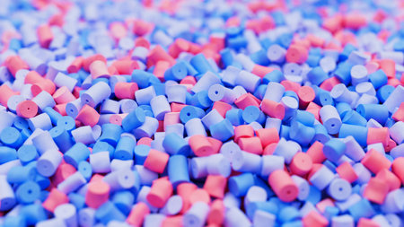 Closeup of colorful pastel mix plastic polypropylene granules, masterbatch polymer grain with...