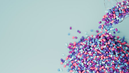 Top view of colorful pastel plastic polypropylene granules pouring from the glass on a light backdrop, masterbatch polymer grain pile. HDPE or PVC resin pellets. 3d render illustrationの写真素材
