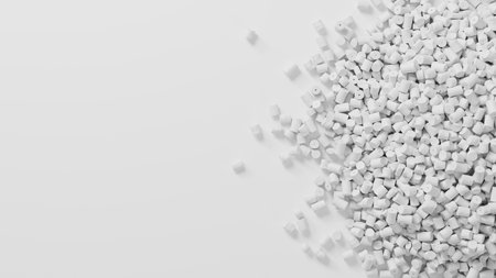 Closeup top view on white plastic polypropylene granules heap on white backdrop, masterbatch polymer grain pile. HDPE or PVC resin pellets. 3d render illustrationの写真素材