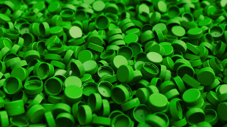 Side view on a pile of green plastic bottle caps with shallow DOF. Plastic industry product. Garbage reuse. 3d render illustrationの写真素材