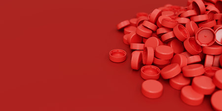 Top view on a pile of red plastic bottle caps on red background with shallow dof. Plastic industry product. Garbage reuse. 3d render illustrationの写真素材