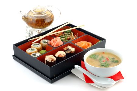 Sushi with tea and soup on a white backgroundの写真素材