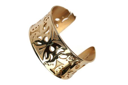 Gold bracelet isolated on a white background.の写真素材