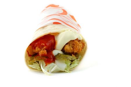 chickenburger with tomatoes and mayonnaise on white a backgroundの写真素材