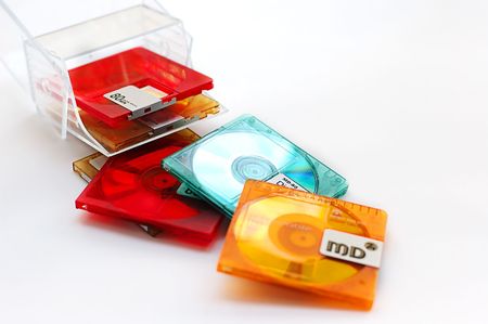 minidiscs different color on a white backgroundの写真素材