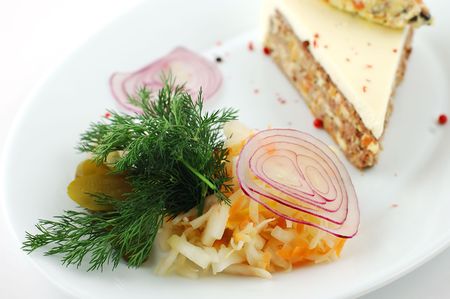 Salad from fresh vegetables with cucumbers and cabbage