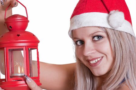 girl with a lamp in a New Year's suit close upの写真素材