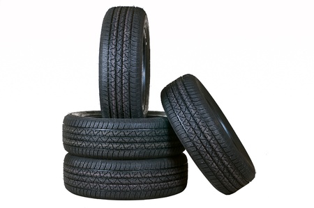 Automobile tyre covers from rubber the seasonal complete set on a white backgroundの写真素材