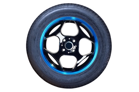 Car tire with rim on a white background