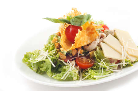 Salad with fresh lettuce leaves, tomato,feta, olives, pepper.の写真素材