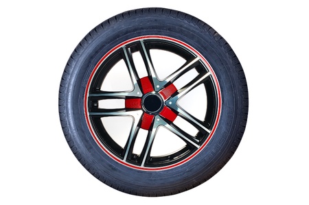 Car tire with rim on a white backgroundの写真素材