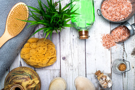 items for spa on a wooden background. view from above.の写真素材