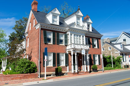 Leesburg, Virginia, USA - May 5, 2021. Two story brick historic house on the street of old Leesburg.のeditorial素材