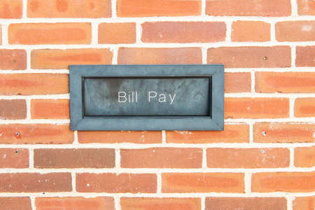 hole in a brick wall to pay for various services without operator intervention.の写真素材