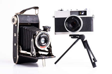 Leesburg. Virginia, USA. September 15th. 2021, Two vintage analog cameras from different eras on a white background.の写真素材