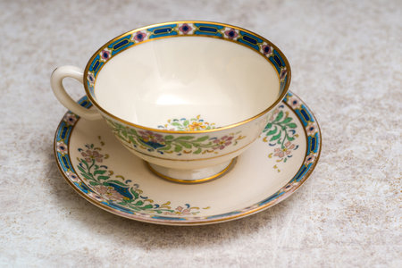 Antique tea cup and saucer patterned. close up.の写真素材