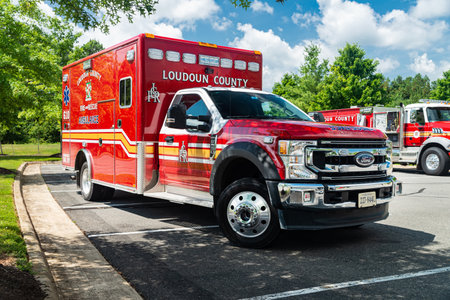 emergency vehicle from the Leesburg Virginia Fire and Rescue Service. on duty in the suburbs.
