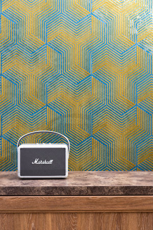 Leesburg. Virginia, USA August 5, 2022. Modern Marshall portable audio system for music lovers stands on a dresser. Space for text.のeditorial素材