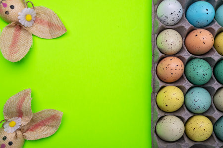colorful easter eggs in a container Preparing for the holiday of light easter. view from above....
