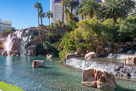 Waterfall and body of water next to the Hotel and Casino on the Strip in Las Vegas, Nevada.のeditorial素材