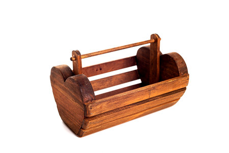 wooden empty basket isolated on white backgroundの写真素材