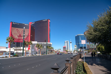modern buildings with tinted glass walls on Las Vegas Blvd, The Strip, in sunlight under a blue sky.のeditorial素材
