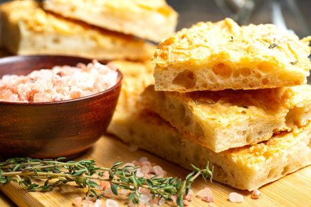 slices of fresh italian focaccho close-up.の写真素材