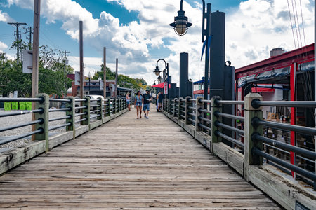 Wilmington, North Carolina Riverwalk along the waterfront of the Cape Fear Riverのeditorial素材