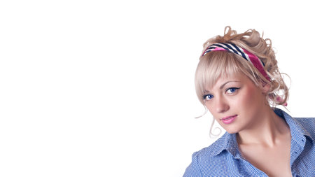 blue-eyed blonde in a blue shirt looks at the camera. Isolated on a white background. Banner. Space for text.の写真素材