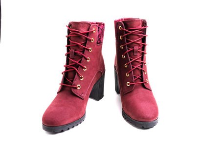 Autumn and winter women's cherry ankle boots isolated on white background. Front view.