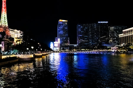 View of the Eiffel Tower and the pond at the Bellagio Hotel on the boulevard Strip at night,のeditorial素材