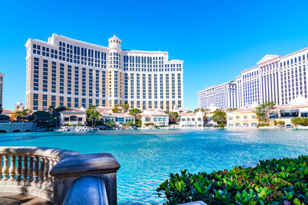 Bellagio is luxury hotel and casino located on the Las Vegas Strip. Pond with emerald water on sunny dayのeditorial素材