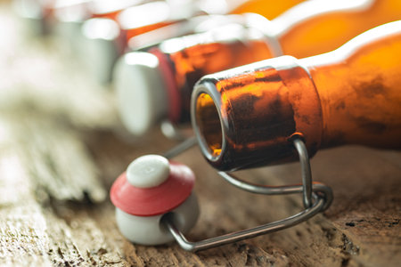 Crafted tradition: brown beer bottles with Bugel plugs. Capturing flavor, sealing excellenceの写真素材