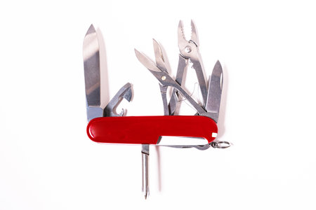 Popular multifunctional folding Swiss knife on a white background.のeditorial素材