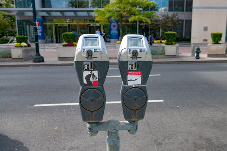 Automated contactless payment machine for parking on the roadside in the city center.のeditorial素材