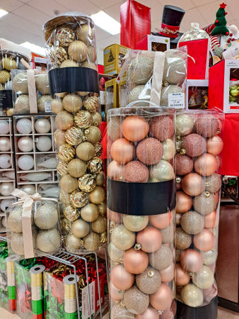 Christmas tree ornaments and gifts on the supermarket counter before Christmas.のeditorial素材