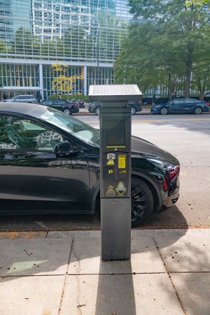 Autonomous Automated solar powered contactless parking payment machine by the roadside.のeditorial素材